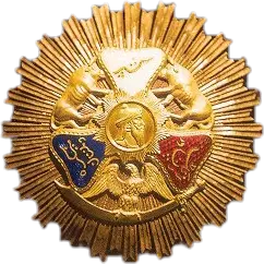 Gold medallion awarded by Ranjit Singh to European officers of the Sikh Empire — sunburst star, gold, enamel.