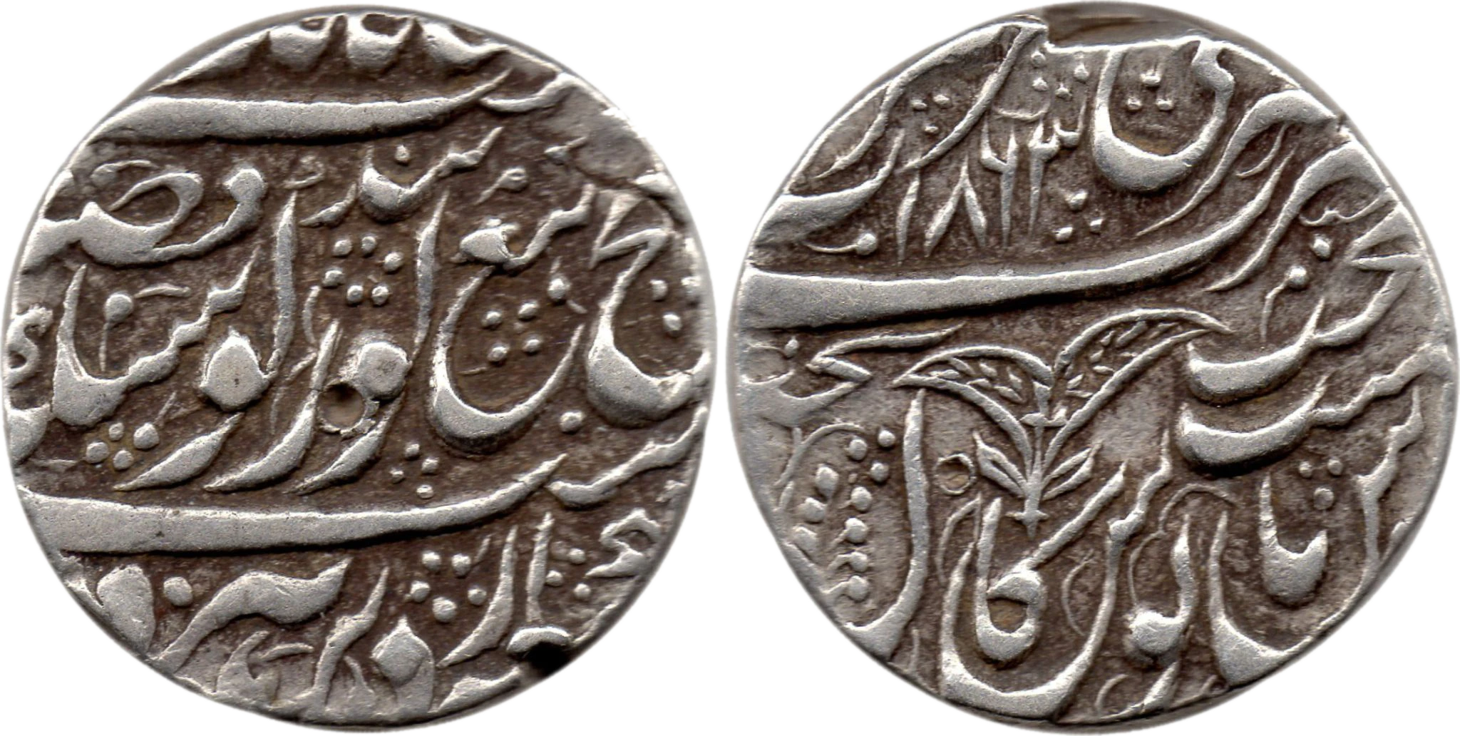 VS 1863 Amritsar double-leaf rupee — reverse carries two leaves in place of the standard single sprig or Ber flower, a distinct die variety