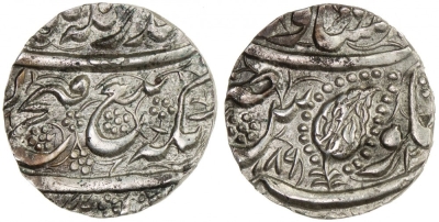 Peshawar, VS1892, 1/2 Rupee
Stephen Album, Auction 24, Session D, Lot 1893 

SIKH EMPIRE: AR ½ rupee (4.17g), Peshawar, VS1892, KM-97, Herrli-13.02.05, superb strike, one of the rarest silver coins of the Sikh Empire, choice EF to About Unc, RRR.

http://db.stevealbum.com/php/lot_auc.php?site=1&sale=24&lot=1893&lang=1
