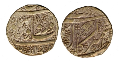 Kashmir Mint, VS1882 Rupee; Flag on Obverse
� The Trustees of the British Museum

http://www.britishmuseum.org/research/collection_online/collection_object_details.aspx?objectId=1505145&partId=1
