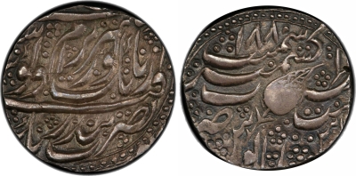 Kashmir Mint, VS1880, Sri Ram in Farsi
Stephen Album Rare Coins
Auction 41
SIKH EMPIRE: AR rupee (11.06g), Kashmir, VS1880, KM-46.14, Herrli-06.11.04, with the addition phrase sri r�m in Persian in the obverse field, above the word guru, as the example illustrated by Herrli but without the dagger across the stem of the leaf on the reverse, beautifully toned, PCGS graded AU53, RRR, ex Jess A. Yockers Collection.
