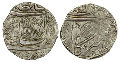 Kashmir Mint, VS1882 Rupee, Flag Symbol
Steve Album Auction 21
Lot 1308
SIKH EMPIRE: AR rupee (11.07g), Kashmir, VS1882, KM-46.8, Herrli-06.15.04, flag in obverse center, facing to the right, superb strike, EF to About Unc, R.
http://db.stevealbum.com/php/lot_auc.php?site=2&sale=21&lot=1308&lang=1&cust=0
