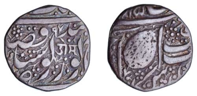 Amritsar, VS1885/1897, Nanakshahi 1/2 Rupee, Om in Nagri
Spink Auctions
Auction: 1012 - Ancient, English & Foreign Coins & Commemorative Medals 
Lot: 527 
India, Sikh Empire, 1/2-Rupee, Amritsar, VS1885 / 97, with Gurmuki legend "om" (KM.19.4; Herrli 01.11.05), good fine, scarce

