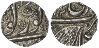 Amritsar, VS1884/1895, Gobindshahi 1/8 Rupee
Stephen Album Auction 24
Session D, Lot 1872
SIKH EMPIRE: AR 1/8 rupee (1.38g), Amritsar, VS[18]9(5), KM-17.1, VS1884 series, same obverse die as the illustrated KM specimen, which shows the full "95" of the date, lovely toning, EF to About Unc, RRR, ex Stephen Album Pricelist #32, Lot 1502 (August 1983), then offered for the timely price of $50. 

http://db.stevealbum.com/php/lot_auc.php?site=1&sale=24&lot=1872&lang=1
