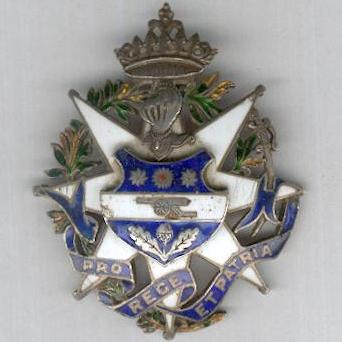 Kapurthala State - Nishan-i-Shahi, Sash Badge, Class I
I Class Sash Badge
Eight-pointed white enamel and silver star of multi-part constriction with green enamel laurel wreath between the arms; the face with a scalloped silver and blue, white and red enamel escutcheon imposed centrally bearing the princely arms of Kapurthala, a silver knight�s helm above, a princely Indian coronet at the top, a tulwar, point down, to the right, a blue enamel ribbon below inscribed in silver letters �PRO REGE ET PATRIA� (for King and Country); the reverse plain with hook for wear; height 58.74mm (2.31 inches), width 49.5mm (1.95 inches); slight loss of green enamel from the laurel wreath and of white enamel from the upper right tip of the star, �hairs� to the white enamel of the left, right and lower left arms, small chips and pits to the enamel of the imposed shield. The Order was instituted by Major General His Highness Sir Jagatjit Singh Bahadur, Maharaja of Kapurthala, in 1897. It was a general order of merit with both military and civil divisions and awarded in three classes to members of the royal household, state officials, military officers and other prominent meritorious persons. The Maharaja was a noted Francophile and it is suggested that the Order was designed and manufactured by Arthus Bertrand of Paris. The Order became obsolete in 1950 following Indian independence.

http://www.medal-medaille.com/sold/product_info.php?cPath=183&products_id=7219
