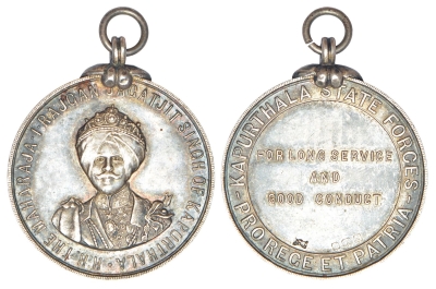 Kapurthala, Maharaja Jagatjit Singh, Long Service and Good Conduct Medal (Military)
Classical Numismatic Gallery, Ahmedabad, GJ, India
Auction 46
Kapurthala, Jagatjit Singh, Long Service and Good Conduct (Military), silver medal, awarded to 2019 Sep Bisan Singh,not listed in McClenaghan, 19.20g. Obv: Portrait bust of Jagatjit Singh front facing, around legend H.H. THE MAHARAJA-I-RAJGAN JAGATJIT SINGH OF KAPURTHALA. Rev: Legend FOR LONG SERVICE AND GOOD CONDUCT in circle around legend KAPURTHALA STATE FORCES/PROREET PATRIA; with suspension ring.


