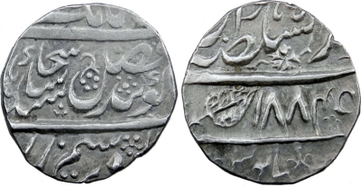 Lahore, VS1884 Rupee
Stephen Album Rare Coins - Auction 11

SIKH EMPIRE: AR Nanakshahi rupee (11.13g), Lahore, VS1884, KM-66.1, Herrli-08.06.04, Extremely Fine.
